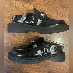 Black Loafers With Silver Embellishments